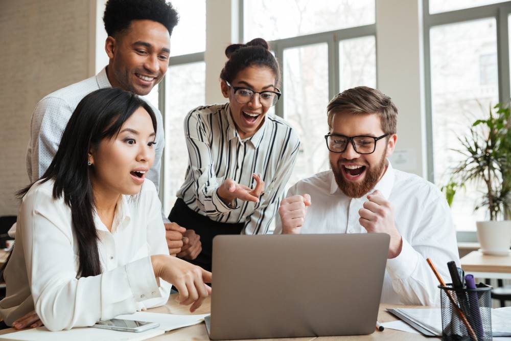 surprised screaming young business colleagues Medium